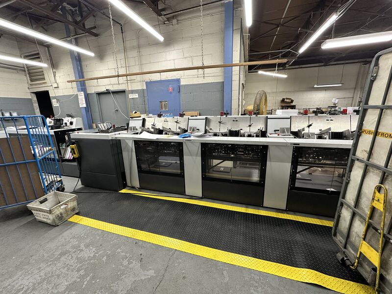 Collating and binding line with feeder stations